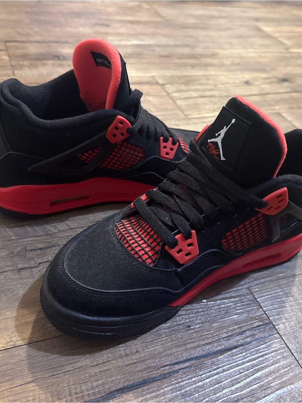 Red Thunder Jordan 4’s
